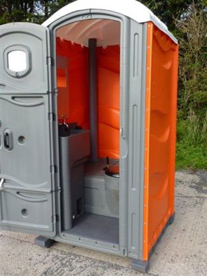 Open Door of a Portable Toilet from Griffin Toilet Hire