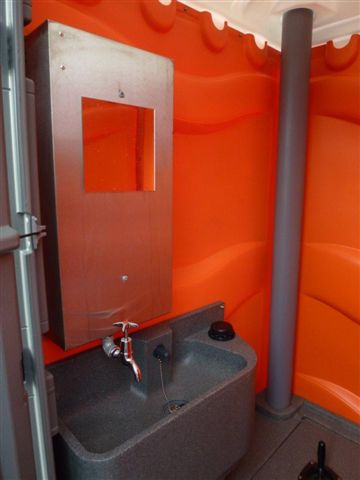 Sink and Hotwater Dispenser of Portable Toilet from Griffin Toilet Hire