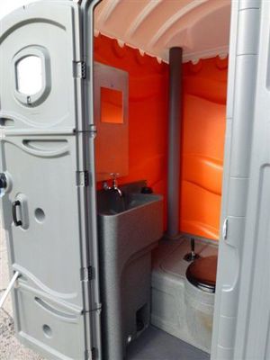 View of Toilet and Sink from a Portable Toilet from Griffin Toilet Hire